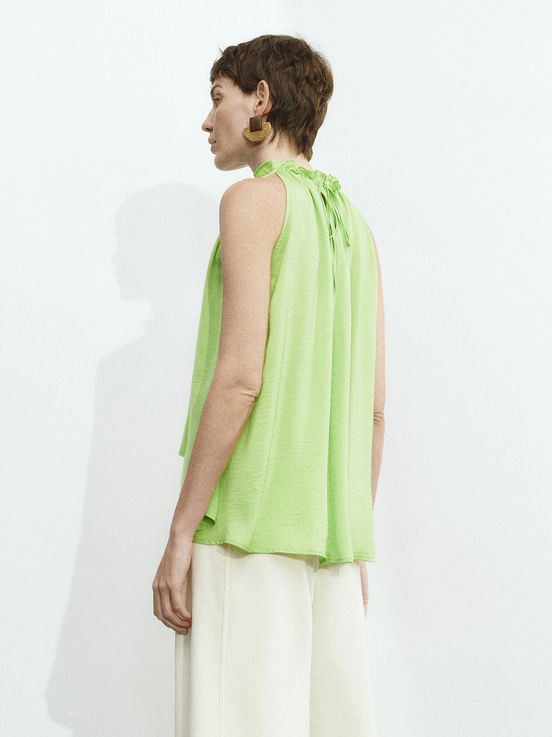 Sleeveless Ruffle Tie Blouses