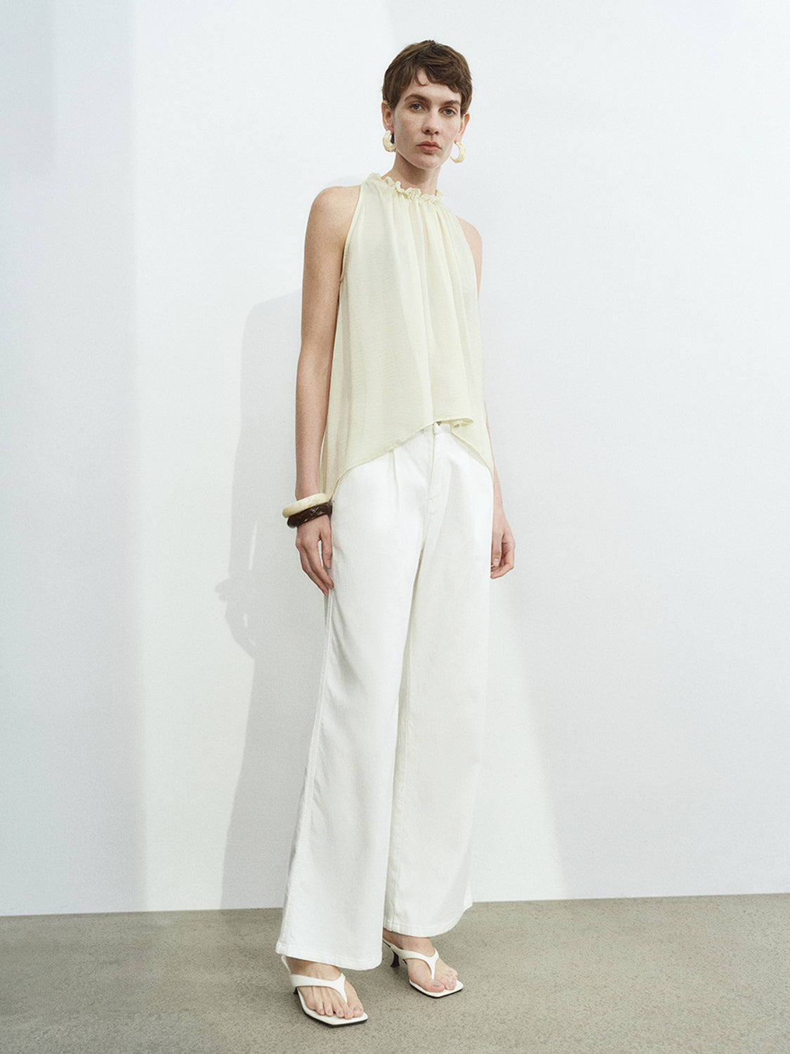 Sleeveless Ruffle Tie Blouses
