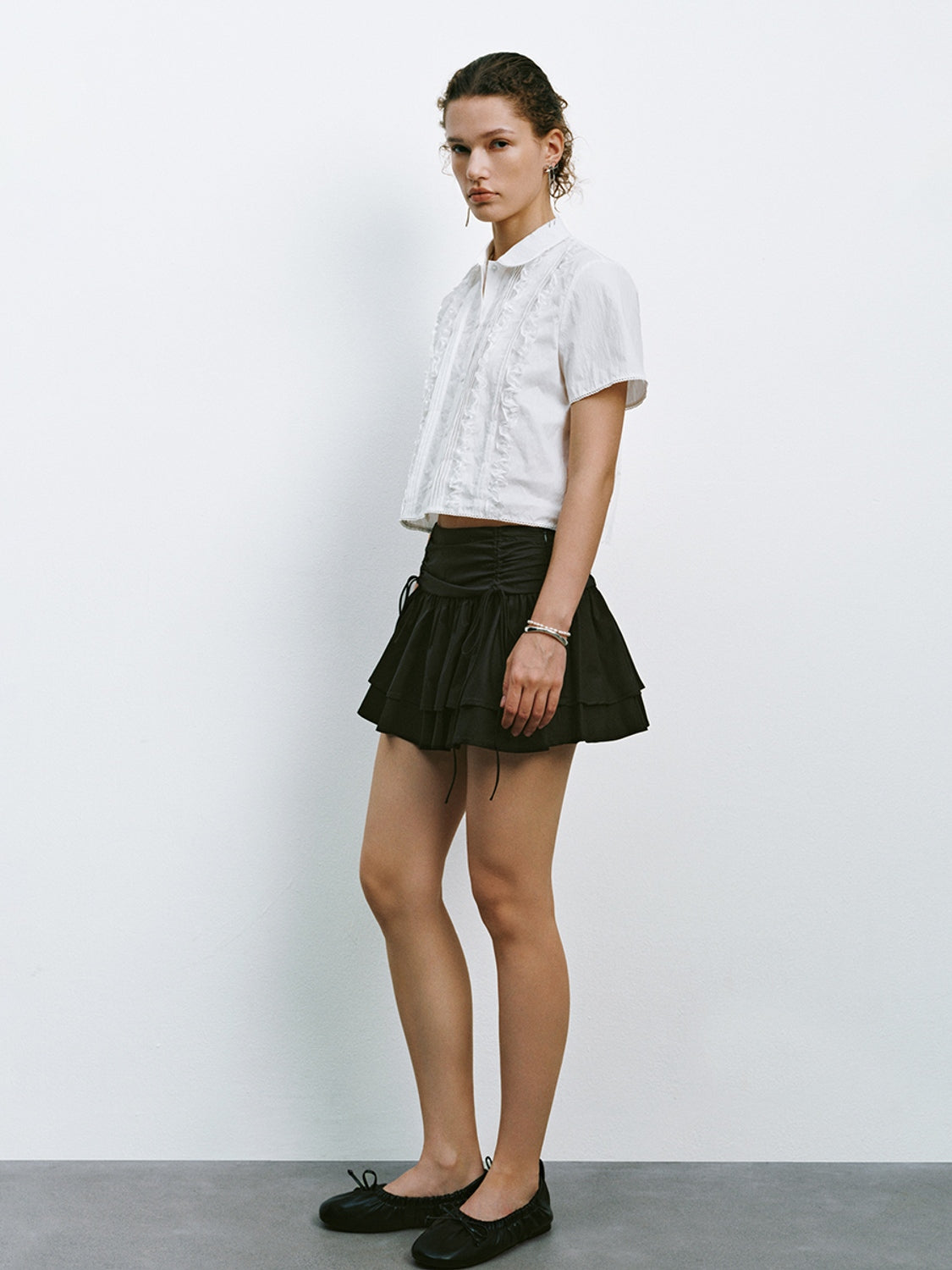 Raw Edge Tiered Mini Skirts